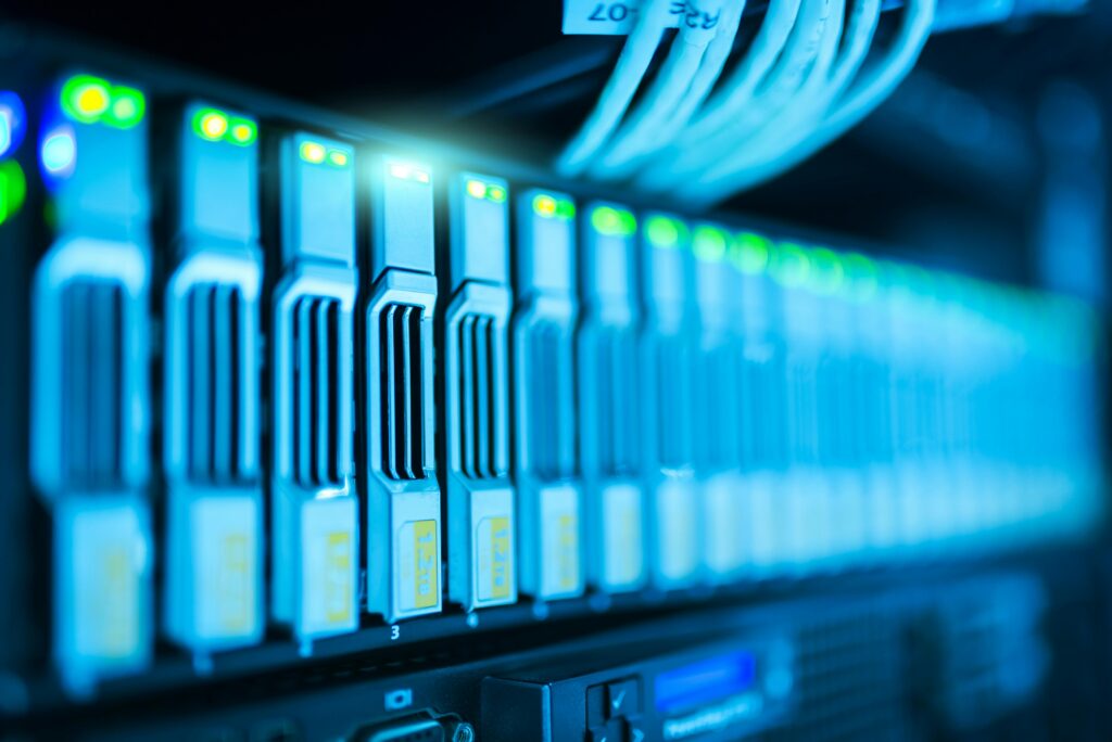 pexels-photo-1148820-1148820 Detailed image of a server rack with glowing lights in a modern data center.