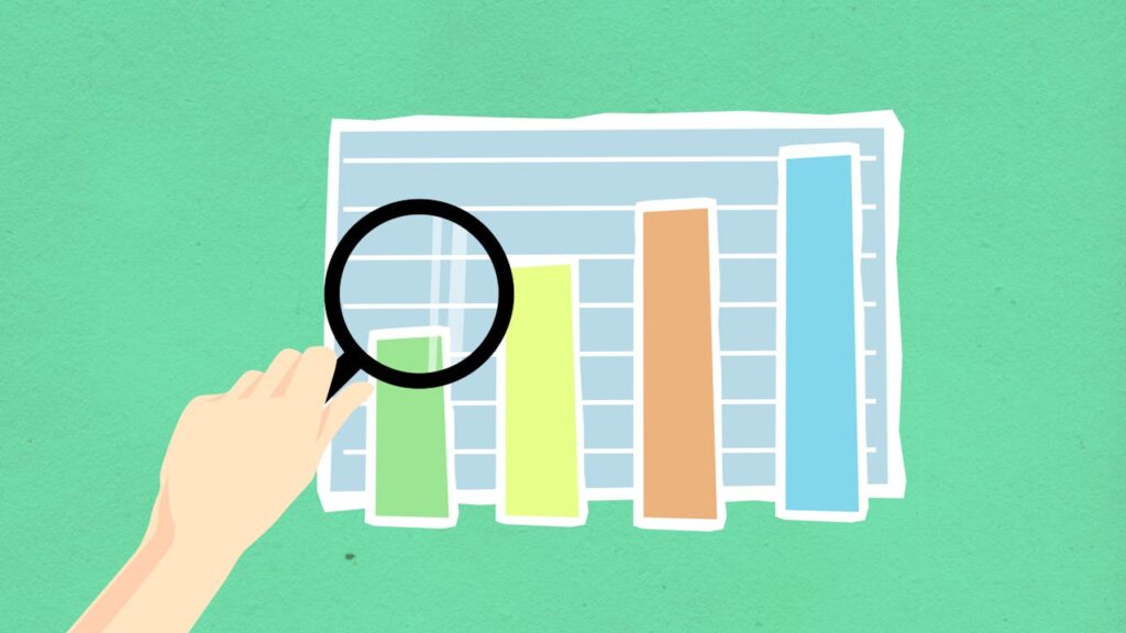 pexels-photo-5841845 Illustration of a hand using a magnifying glass over a colorful bar chart on green background.